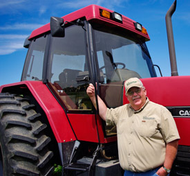 Joe Anchor with his Case International tractor